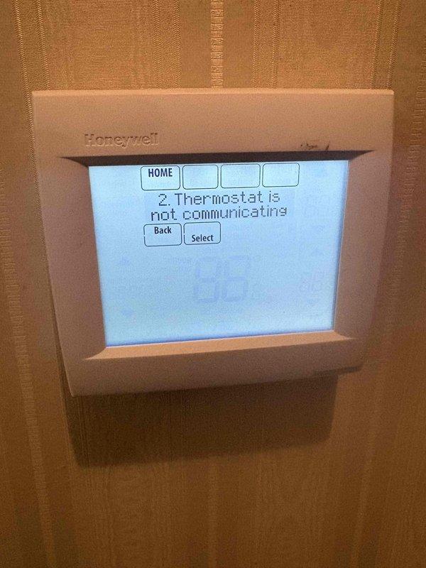 Responded to a no-heat call on an American Standard furnace and found the Honeywell wall thermostat displaying "Replace CR2032 coin cell battery" and "Thermostat is not communicating" fault messages, indicating a depleted thermostat battery was interrupting communication with the furnace control. Replaced the CR2032 battery, restoring thermostat power and communication so the furnace can receive heat calls.