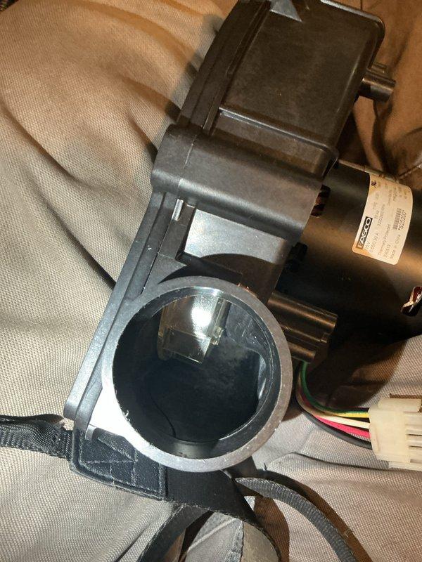Performed tune-ups on two furnaces and associated humidifiers in the basement, including inspection of the inducer motor assembly and use of a borescope to inspect and clear the condensate drain line, removing matted debris blockage. Inducer motor assembly was removed and serviced during the diagnostic and maintenance process.
