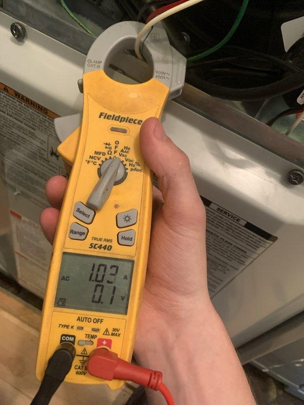 Performed seasonal tune-up and inspection on two furnaces, one in the basement and one in a main-floor utility closet. Verified thermostat operation and settings, and measured blower motor amperage with a clamp meter (1.03 A) to confirm the electrical components were operating within normal parameters. Both units were operational at completion, with no visible damage, rust, or other deficiencies noted.