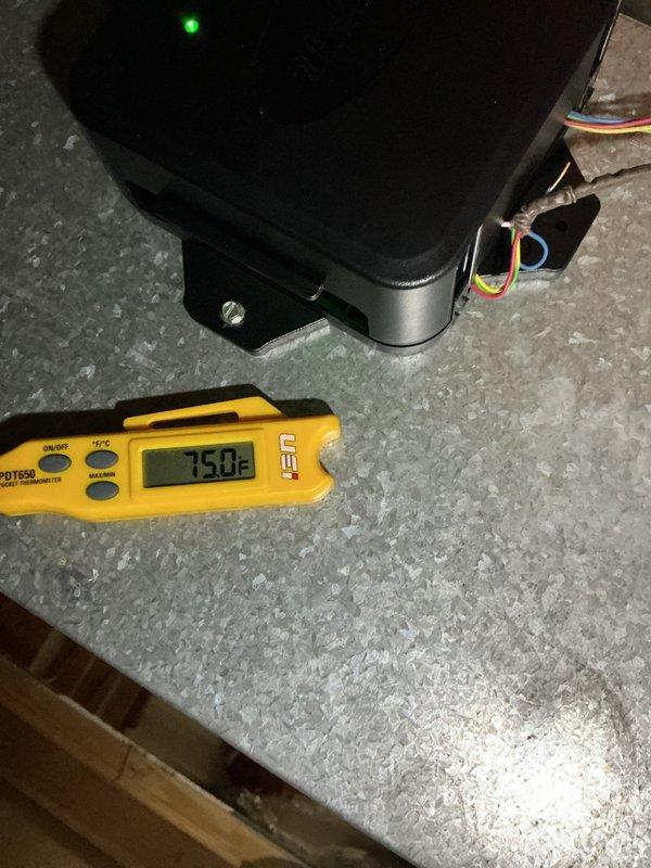 Performed a heating tune-up on a 14-year-old furnace, including electrical testing with a true RMS clamp meter to measure component amperage draw and verification of ambient temperature with a digital pocket thermometer. Inspected the furnace control board and wiring connections, confirming the status indicator was operating normally and the system was functioning properly.