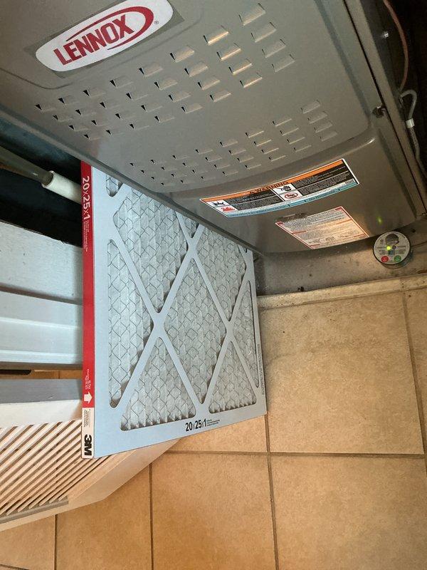 Performed a heating tune-up on a 9-year-old Lennox furnace, inspecting the unit cabinet and components for signs of frost, rust, or damage, with none found. Replaced the 20x25x1 pleated return air filter and verified the Sensi thermostat is operating properly and in good condition. The system was left in proper working order.