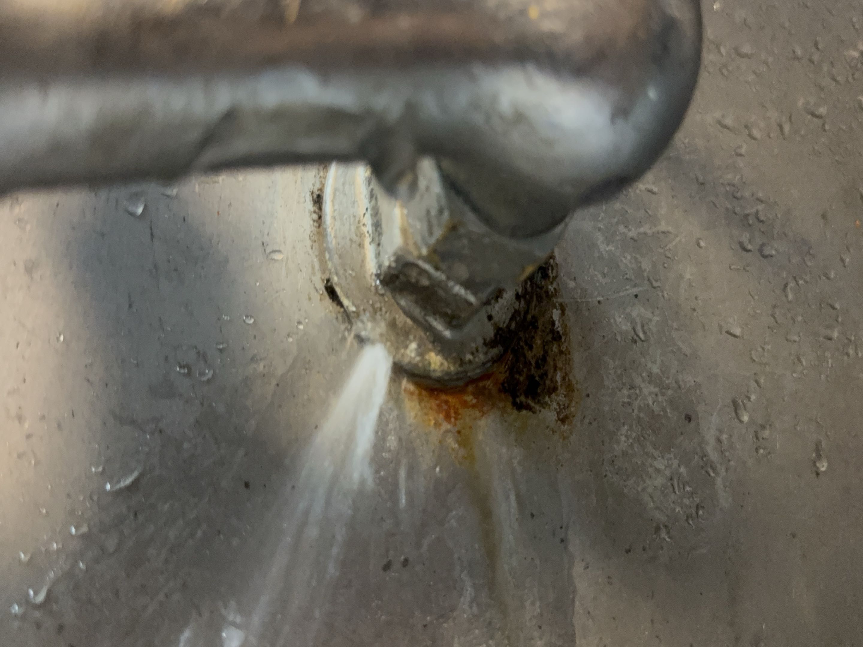 Upon arrival, I swiftly shut off the water supply to prevent further damage. A thorough inspection of the wall-mounted faucet revealed significant wear in the assembly and mounting hardware. The water spraying from behind the wall indicated a serious issue. After evaluating the condition, I discussed repair versus replacement options, focusing on reliability, cost-effectiveness, and long-term performance. The decision was made to replace the worn components to restore proper operation and reduce the risk of future leaks. I carefully disassembled the faulty assembly, ensuring minimal disruption. New, high-quality parts were installed, and the faucet was securely remounted. Testing confirmed the repair was successful, and the faucet now operates smoothly without leaks.