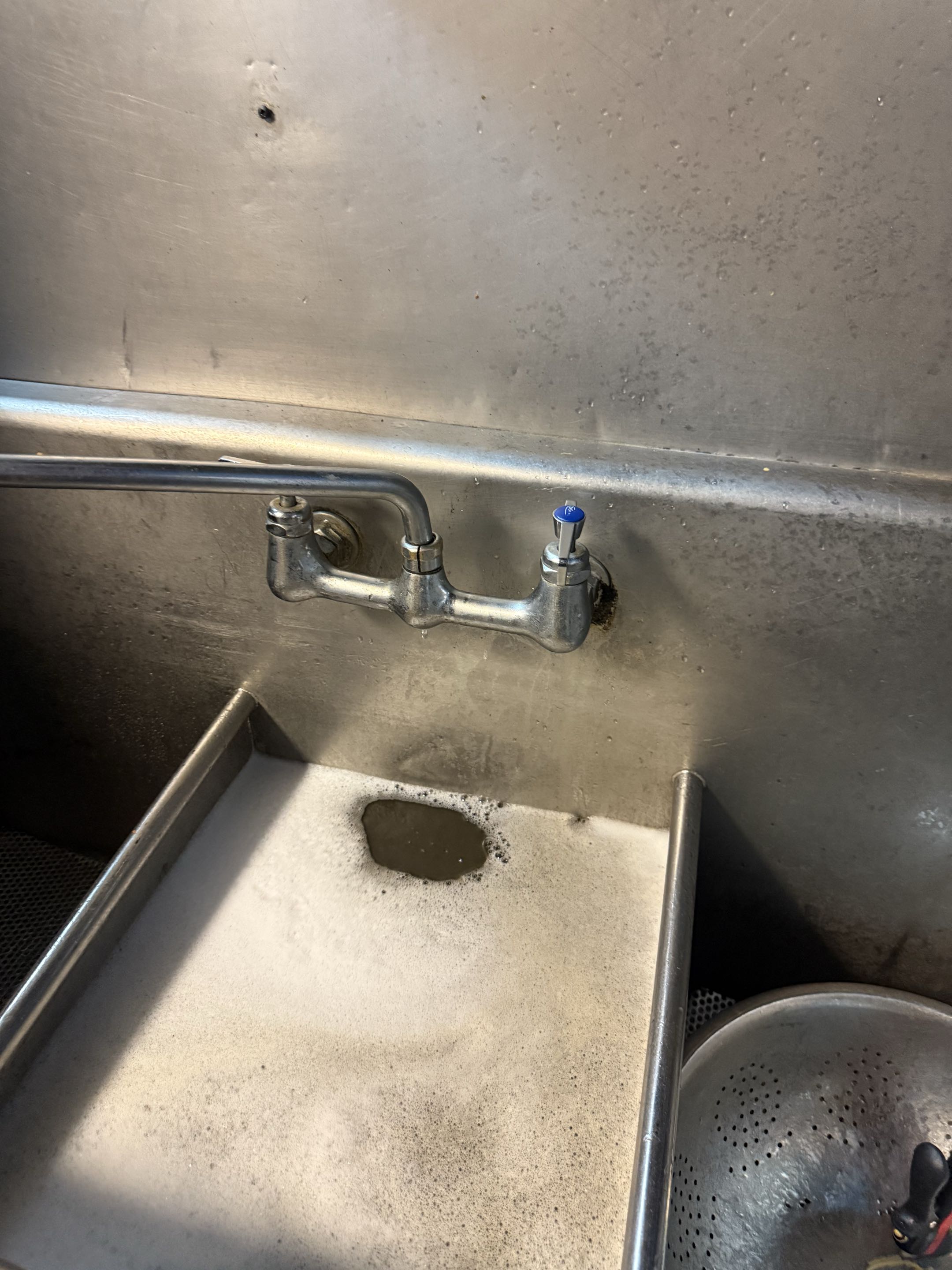 Upon arrival, I swiftly shut off the water supply to prevent further damage. A thorough inspection of the wall-mounted faucet revealed significant wear in the assembly and mounting hardware. The water spraying from behind the wall indicated a serious issue. After evaluating the condition, I discussed repair versus replacement options, focusing on reliability, cost-effectiveness, and long-term performance. The decision was made to replace the worn components to restore proper operation and reduce the risk of future leaks. I carefully disassembled the faulty assembly, ensuring minimal disruption. New, high-quality parts were installed, and the faucet was securely remounted. Testing confirmed the repair was successful, and the faucet now operates smoothly without leaks.