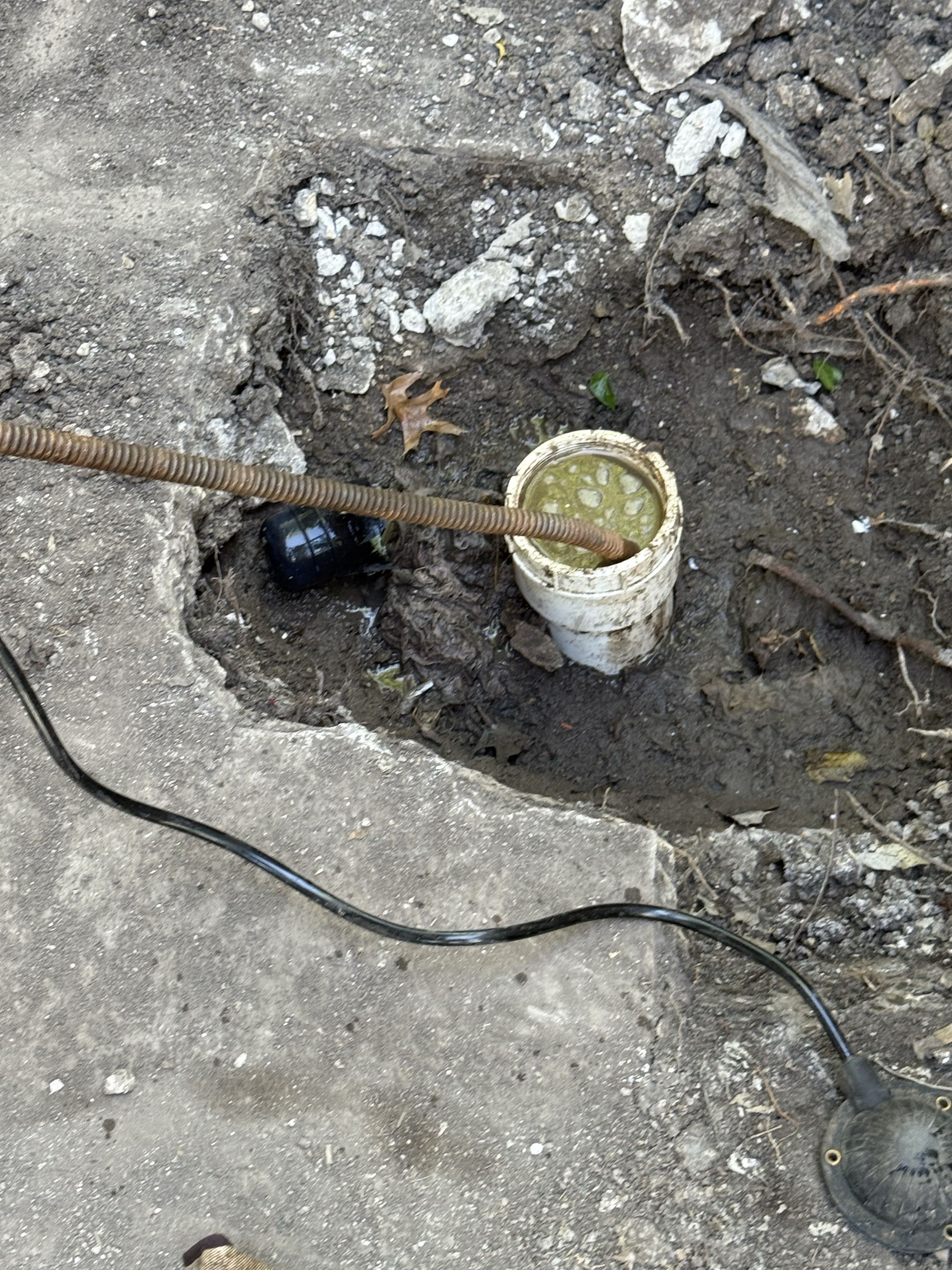 Upon arrival, we identified a clogged sewer line. To address this, we carefully excavated the area to locate the cleanout top. Using specialized equipment, we attempted to clear the clog. However, after deploying a sewer camera, we discovered a significant break approximately 5 feet from the cleanout. This necessitated further evaluation to determine the best course of action for replacing the damaged section. We are currently assessing options to ensure the issue is resolved effectively and efficiently.