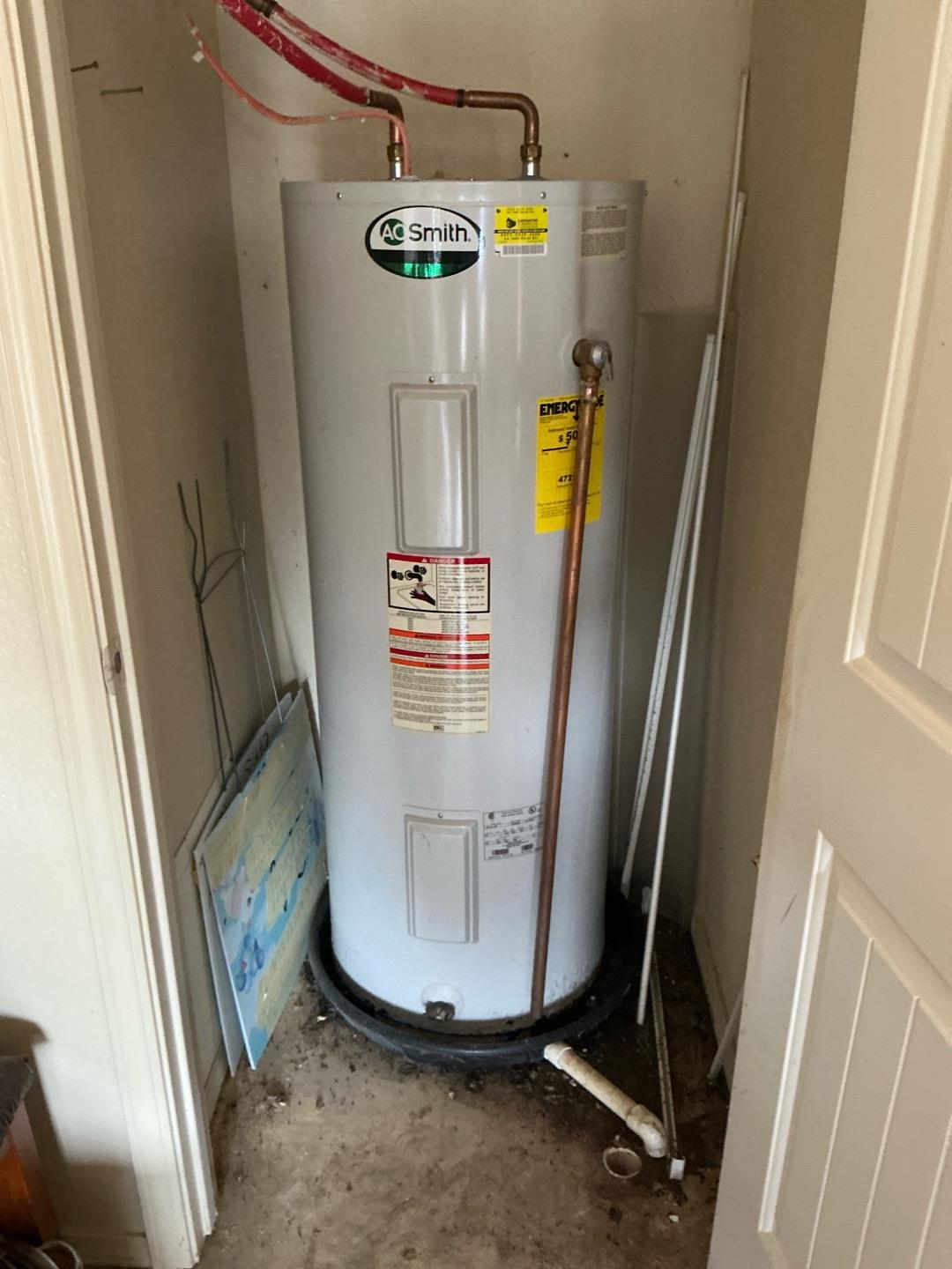 water heater drain clog
