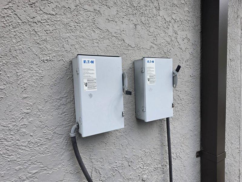Responded to tenant complaint of 10-degree temperature discrepancy between thermostat setpoint (70°F) and displayed room temperature (80°F). Performed diagnostic inspection of HVAC system including outdoor condenser unit, electrical disconnects, and thermostat operation. Verified condenser unit operational status, checked electrical connections at dual Eaton disconnect boxes, and confirmed proper power supply to system. Investigated potential causes including thermostat calibration error, temperature sensor malfunction, and system cycling issues to resolve the reported temperature differential.