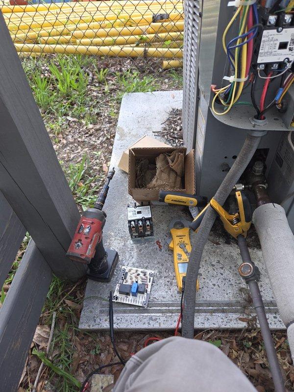 Replaced failed contactor (CONT3P050024V, 24V AC coil) and defrost control board on outdoor heat pump unit. Transferred all electrical connections to new contactor, ensuring proper wire routing and secure terminations across all three poles. Verified system startup, confirmed contactor engagement during compressor call, and tested defrost cycle operation to ensure all components functioning correctly.