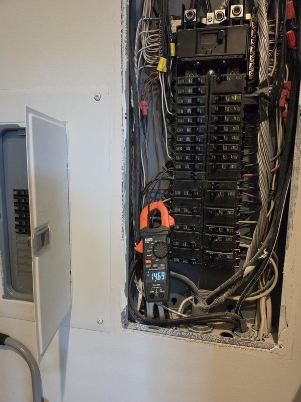 Isle of Palms, SC - Responded to service call for recurring circuit breaker trips. Performed comprehensive electrical panel diagnostics using clamp meter to measure voltage and amperage throughout the system. Identified high current draw of 1469 amps at main service entrance and verified proper 120.1-volt distribution to branch circuits. Inspected all circuit breaker connections, wire terminations, and panel integrity for signs of overload, loose connections, or damaged components. Documented panel configuration and electrical readings to determine root cause of nuisance tripping and provided recommendations for resolving the electrical issues.