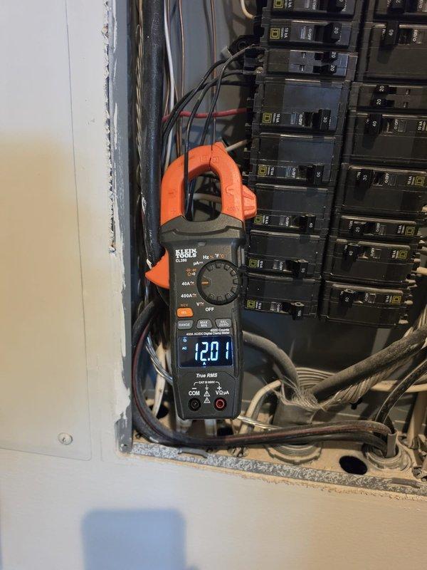 Isle of Palms, SC - Responded to service call for recurring circuit breaker trips. Performed comprehensive electrical panel diagnostics using clamp meter to measure voltage and amperage throughout the system. Identified high current draw of 1469 amps at main service entrance and verified proper 120.1-volt distribution to branch circuits. Inspected all circuit breaker connections, wire terminations, and panel integrity for signs of overload, loose connections, or damaged components. Documented panel configuration and electrical readings to determine root cause of nuisance tripping and provided recommendations for resolving the electrical issues.