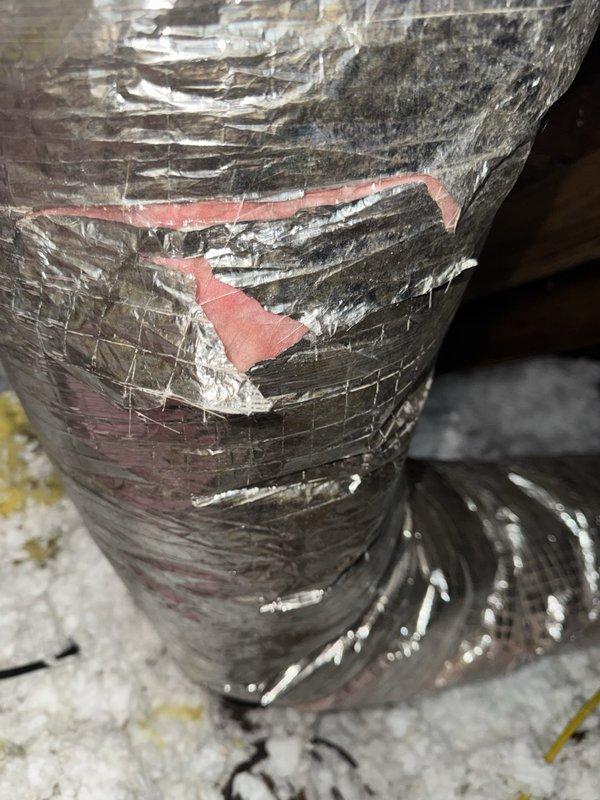 Performed first maintenance service on 2024 Daikin unit. Upon inspection, discovered deteriorated duct insulation wrap with significant tears and separation requiring future attention, along with discolored condensate visible in drain pan assembly. Completed standard maintenance procedures including filter inspection, refrigerant line check, and system operational verification to ensure proper cooling performance.