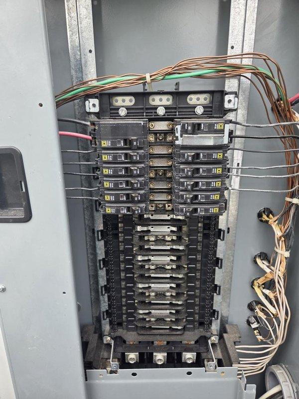 # Commercial HVAC Mini-Split Repair

Responded to a no-power condition on a Mitsubishi Electric mini-split indoor unit. Upon arrival, confirmed the indoor unit control board was not illuminated and the emergency operation button was non-functional, while the outdoor condensing unit was receiving power normally. Inspected the electrical panel and verified proper voltage supply to the system. Traced the power supply circuit from the main electrical distribution panel to both the outdoor and indoor units. Diagnosed a failed indoor unit control board preventing power distribution to the display and control functions. Replaced the defective control board with OEM Mitsubishi Electric replacement part. Restored power to the indoor unit, verified all control functions including display illumination and emergency operation button. Tested system operation through multiple cooling cycles to confirm proper communication between indoor and outdoor units. System restored to full operational status.