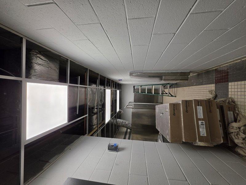 Removed and properly disposed of 36 existing light fixtures from the commercial space. Installed 36 new LED ceiling fixtures in the existing drop ceiling grid, consisting of 23 2x4 fixtures and 13 2x2 fixtures, with all necessary electrical connections completed to code. All debris and construction materials were removed from the site upon completion.