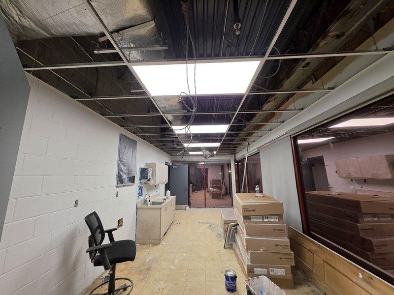 Removed and properly disposed of 36 existing light fixtures from the commercial space. Installed 36 new LED ceiling fixtures in the existing drop ceiling grid, consisting of 23 2x4 fixtures and 13 2x2 fixtures, with all necessary electrical connections completed to code. All debris and construction materials were removed from the site upon completion.