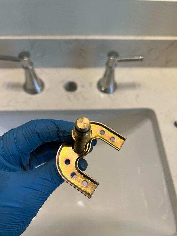 Completed installation of two three-piece wall-mount faucet assemblies in master bathroom. First faucet was installed with new mounting hardware, valve stems, and brass escutcheon plates. Second faucet required troubleshooting for no water flow issue; identified and corrected valve assembly installation error to restore proper water delivery. Verified all supply line connections, tested both faucets for proper operation and flow, and confirmed no leaks at valves or drain connections.