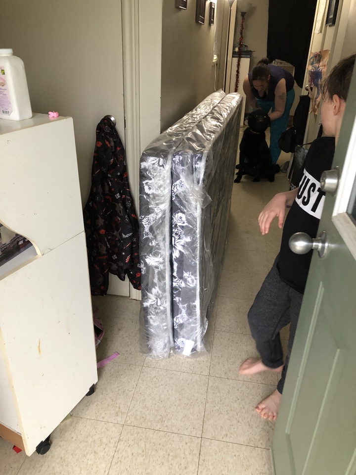Delivering two twin size mattresses