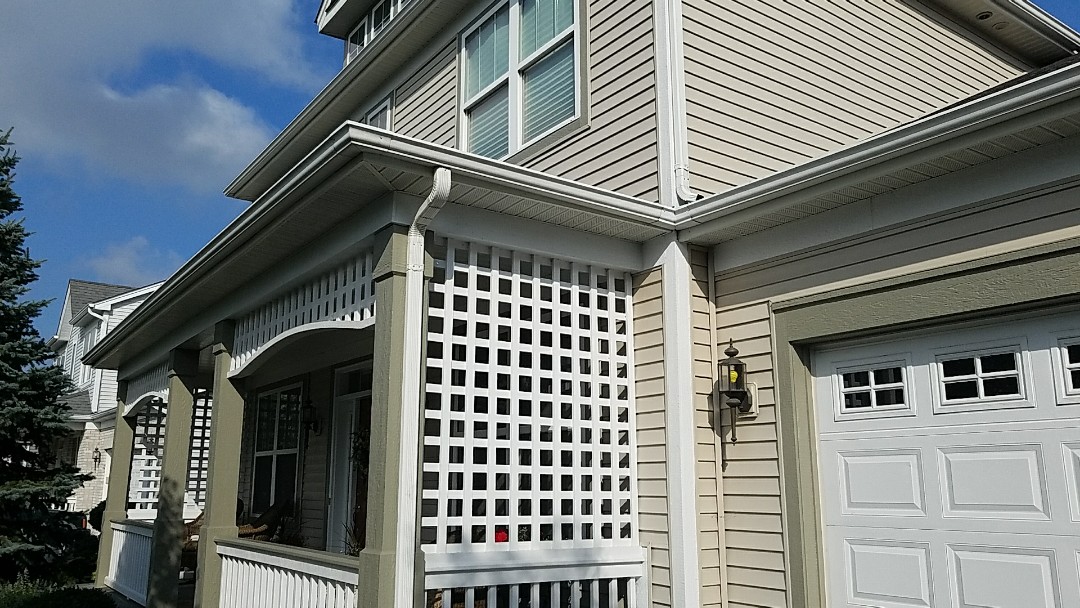Meeting with State Farm insurance adjuster for hail damage claim on an asphalt shingle high-definition roof. Meeting with State Farm insurance adjuster for hail damage claim on an asphalt shingle high-definition roof.