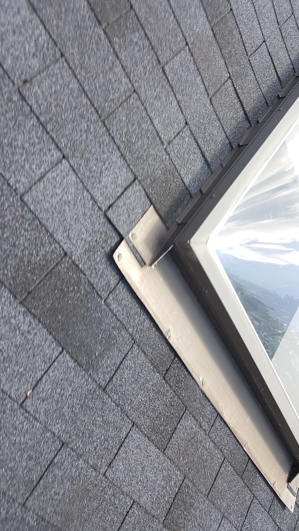 Shingle roof and skylight repair Shingle roof and skylight repair