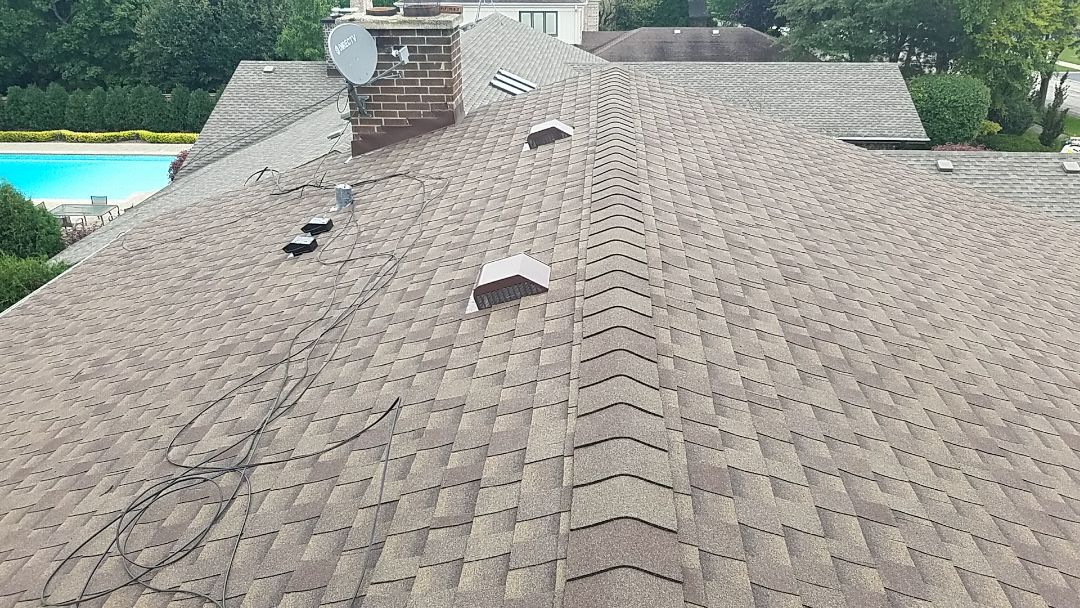 Final inspection on a GAF Timberline Ultra HD roof installed. Color: Barkwood. Final inspection on a GAF Timberline Ultra HD roof installed. Color: Barkwood.