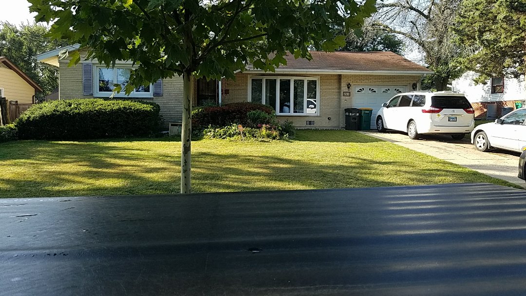 In Elk Grove Village inspecting a roof for hail damage In Elk Grove Village inspecting a roof for hail damage