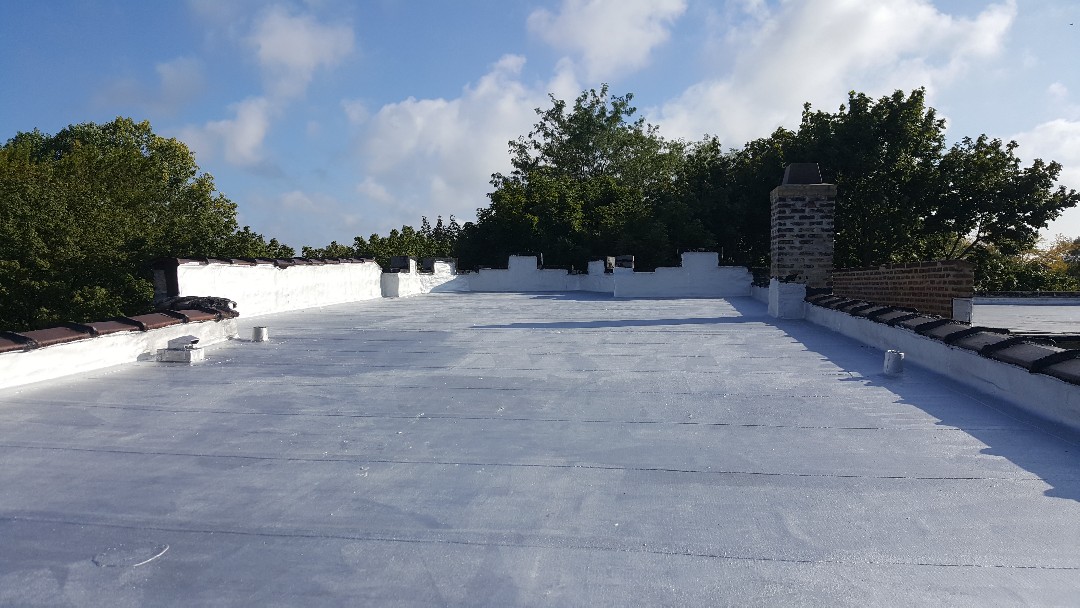 New flat modified bitumen roof New flat modified bitumen roof