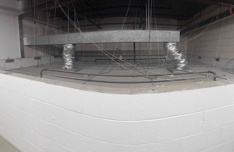 Conducted comprehensive inspection of combustion system with multiple gas burners, verifying proper flame pattern and gas line connections. Assessed HVAC ductwork installation in commercial space, including main horizontal trunk and vertical supply runs with appropriate insulation. Documented existing equipment specifications to establish annual maintenance plan for multiple systems.