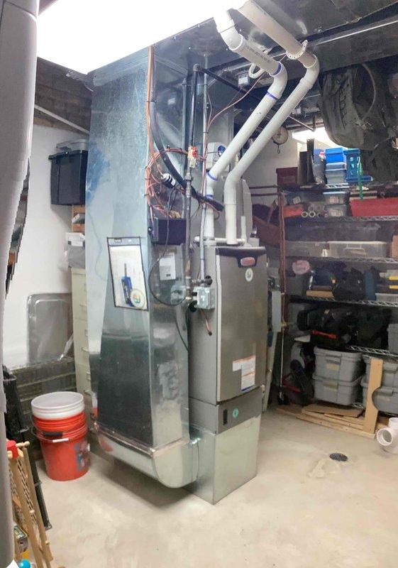 Successfully installed a new furnace system with integrated zone control board in basement utility area. Connected and tested all terminal connections (R1, C, G, Y1, Y2) with proper color-coded wiring to ensure functionality. Verified proper operation of all zones after installation.