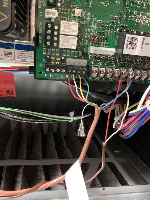 Successfully installed a new furnace system with integrated zone control board in basement utility area. Connected and tested all terminal connections (R1, C, G, Y1, Y2) with proper color-coded wiring to ensure functionality. Verified proper operation of all zones after installation.