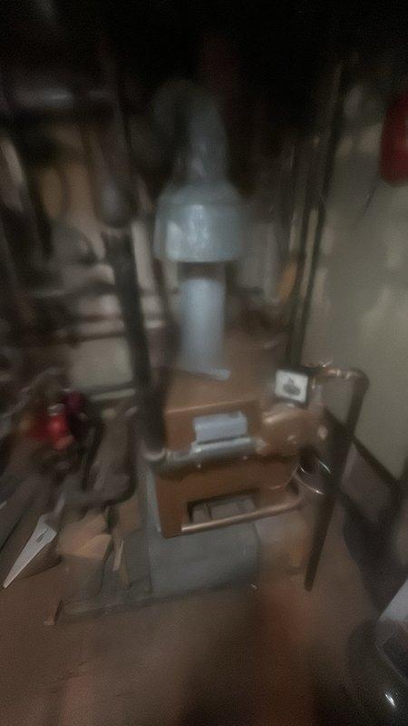 Conducted initial assessment of aging hot water boiler system with pump circulation, estimated to be over 20 years old. Visual inspection revealed significant wear on primary components and connection points. Documented current installation configuration and provided customer with replacement options based on evaluation.