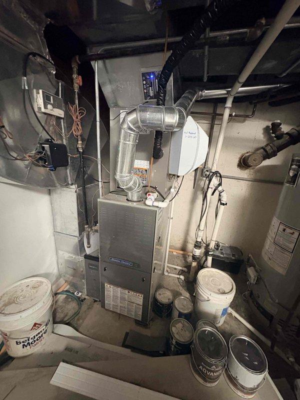 Responded to no-heat service call where customer reported inadequate heating on first floor with air from vents not feeling warm. Upon inspection, discovered furnace was operational with proper burner ignition showing normal blue flame pattern. Visual inspection of the mechanical room revealed no obvious external issues with the furnace unit, ductwork, or associated components. Diagnosed and confirmed system was functioning correctly, with customer educated on proper operation.