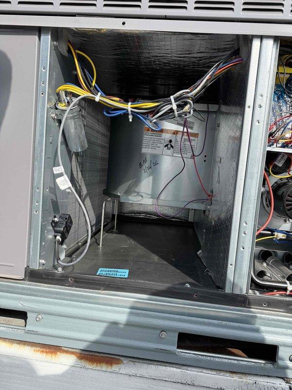 Completed warranty service on Carrier RTU by replacing failed blower motor. Performed electrical testing with UEi clamp meter, verifying proper current readings of 297.6 and inspecting wiring connections. Checked system for airflow restrictions that could have contributed to motor failure; none were found.