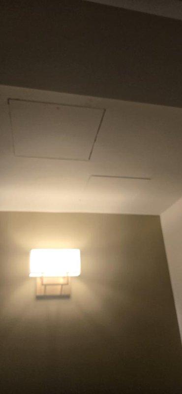 Responded to a water leak issue in a multi-unit building, specifically addressing a leak from an upper unit affecting the unit below. Accessed the building's unique hydronic heating system, which features supply lines through the garage and return lines through the 9th floor ceiling, to repair a defective fitting above the shut-off valve leading to in-floor radiant heat. Completed necessary system drainage, fitting repair, and system refill with air purging to restore proper operation.