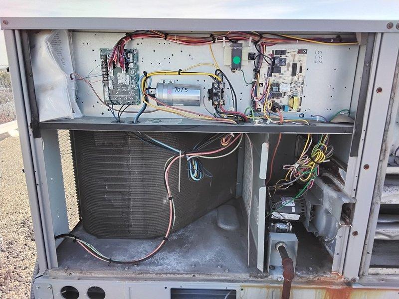 Performed comprehensive Clean and Check service on three systems: two split system AC/air handlers and one rooftop unit. Inspected evaporator coils showing signs of corrosion and age-related wear, and examined electrical components including circuit boards and motor connections. Replaced four filters: two 16x20x1 and two 16x25x2.