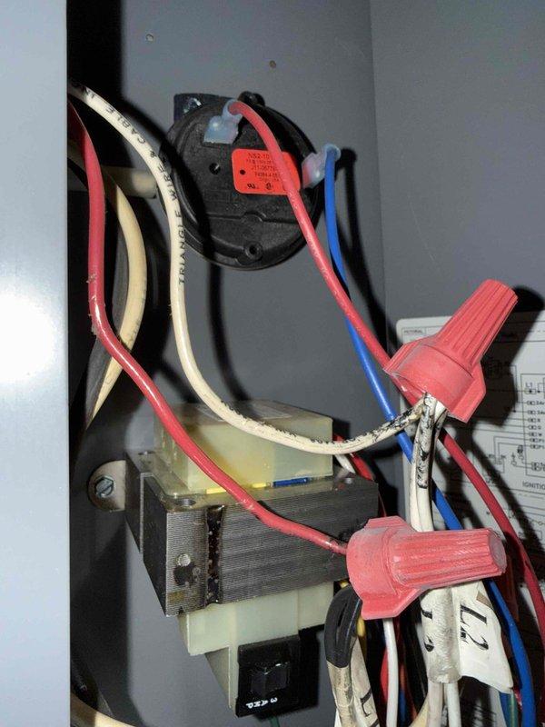 Performed comprehensive tune-up service on customer's HVAC systems, including inspection of one split system and one unit heater as noted from previous records. Observed significant oxidation and wear on copper piping components, particularly in the heating system. Inspected electrical connections, including transformer/relay components and wiring integrity, noting some aging insulation on control wiring. Documented equipment specifications and system condition for maintenance plan development.