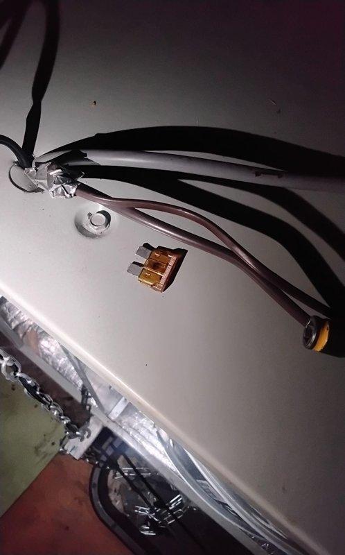 Responded to service call for unresponsive A/C system installed in 2020. Inspected Honeywell digital thermostat which displayed normal temperature readings and appeared to be functioning properly. Examined electrical connections and wiring at the equipment panel, checking terminals and connectors for proper installation and continuity.