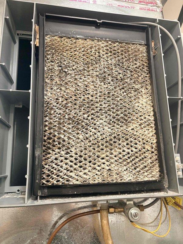Performed Clean and Check service on HVAC system per Comfort Plan agreement. Inspected furnace components, finding significant buildup on evaporator coil/humidifier pad requiring thorough cleaning. Serviced two furnaces, one tankless water heater, and two humidifiers according to maintenance protocol.