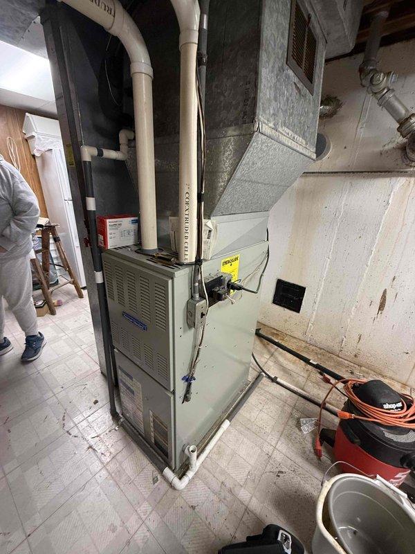 Responded to a no-heat service call for a new customer experiencing thermostat issues. Diagnosed and serviced a Honeywell Home digital thermostat displaying 63°F, verifying proper connections and functionality. Completed system check on the residential furnace installation, confirming proper operation of all components including intake/exhaust piping and ductwork distribution system.