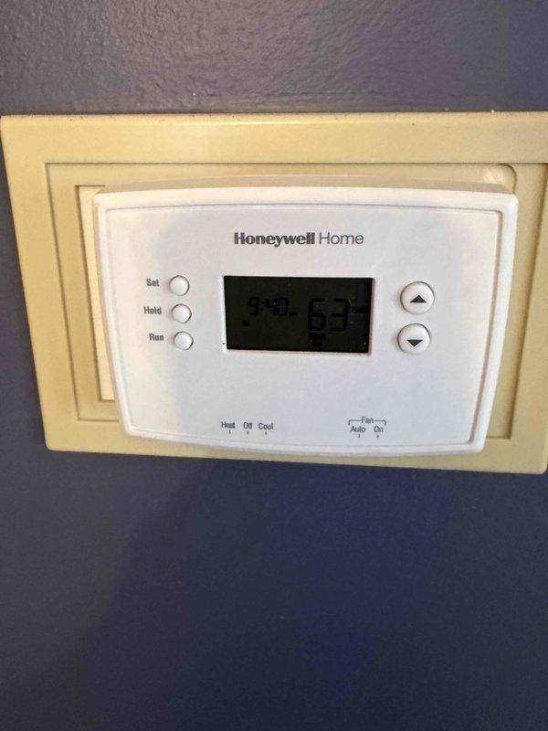 Responded to a no-heat service call for a new customer experiencing thermostat issues. Diagnosed and serviced a Honeywell Home digital thermostat displaying 63°F, verifying proper connections and functionality. Completed system check on the residential furnace installation, confirming proper operation of all components including intake/exhaust piping and ductwork distribution system.