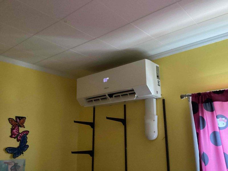 Responded to warranty service call for newly installed mini-split system displaying fault codes. Inspected internal control board components and verified proper installation of wall-mounted indoor unit. Resolved electronic communication issue causing error display, restoring normal operation with temperature reading of 80° now showing on display.