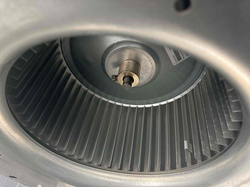 Successfully replaced defective blower motor in RTU 4 (serial ending 9601) on commercial rooftop unit. Removed old motor assembly, installed new compatible replacement, and verified proper operation. Original blower motor was returned to office for warranty processing as required.