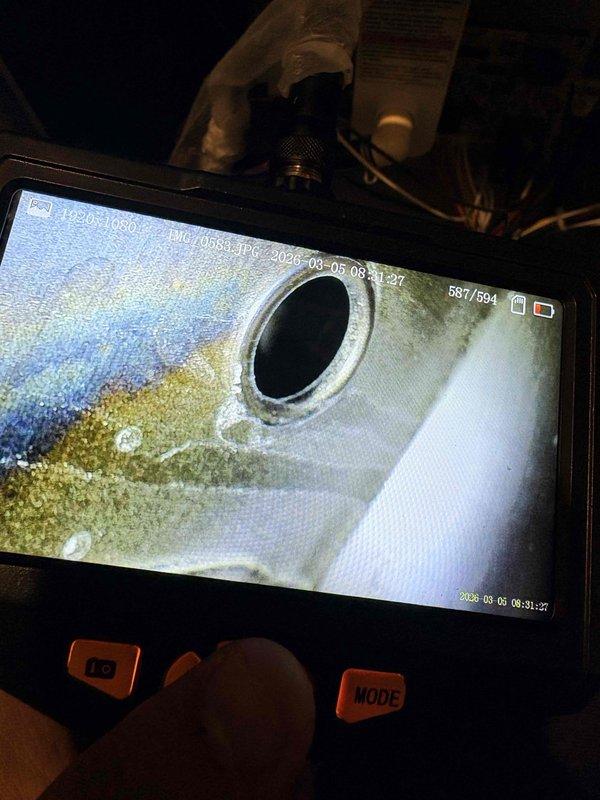 Performed scheduled annual maintenance on dual HVAC systems, including inspection of two furnaces, two humidifiers, and two water heaters under the Gold Standard Plan. Visual inspection confirmed efficient combustion with proper blue flame pattern in furnace chambers, and video inspection of ventilation system revealed minor mineral buildup that was subsequently cleaned to ensure optimal system performance.