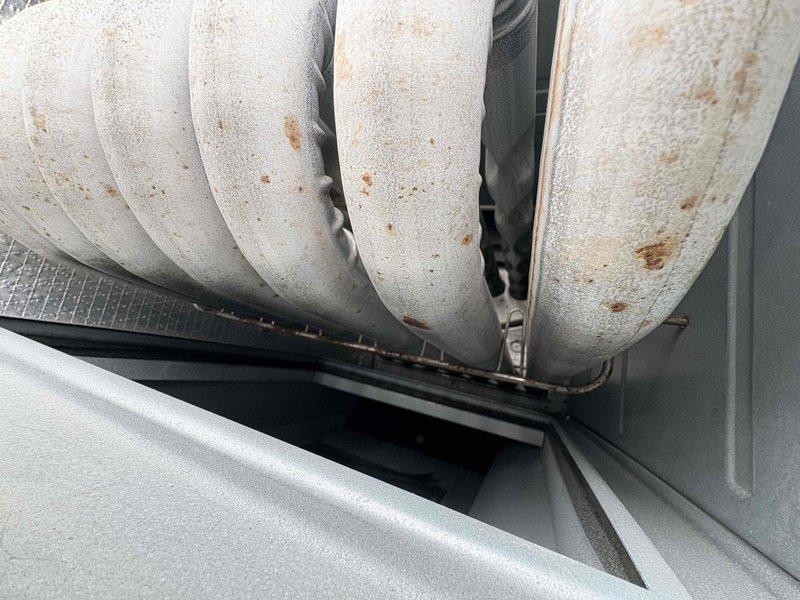 Completed scheduled RTU maintenance service including comprehensive cleaning and inspection of condenser coils which showed signs of corrosion. Performed filter changes throughout the office system and documented condition of ductwork which displayed some moisture-related staining requiring future attention.