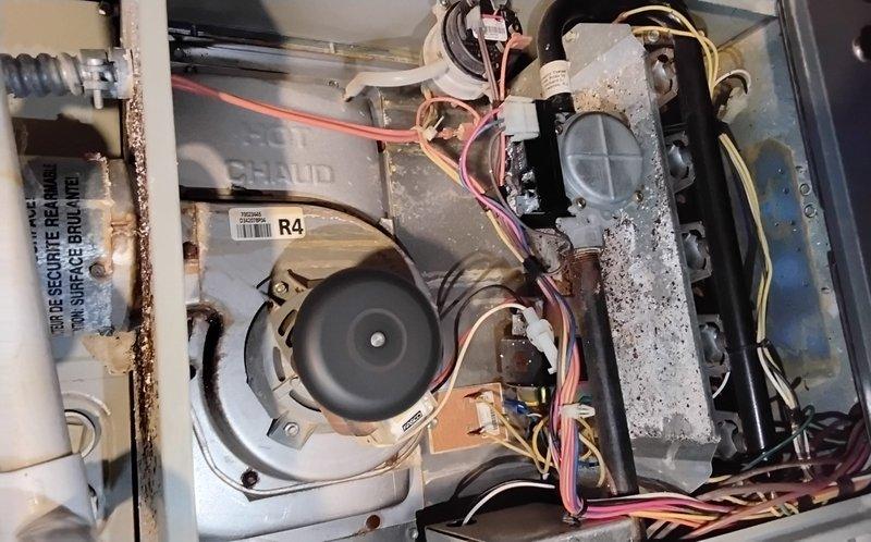 Performed comprehensive Clean and Check service on one HVAC system under Silver Comfort Plan. Inspected interior components including blower motor assembly and heat exchanger, noting dust accumulation and minor surface corrosion consistent with normal wear. Addressed reported high-pitch squeal during heating cycle and diagnosed non-functioning humidity thermostat; recommended repair to maintain higher humidity levels during cooler weather.