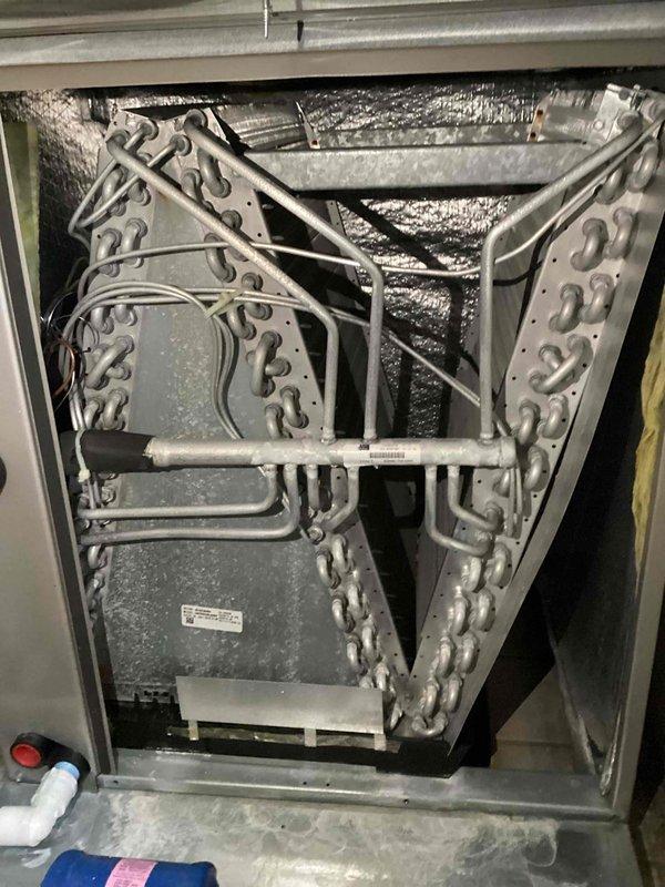 Performed Comfort Plan Clean and Check service on two AC systems. Inspected and cleaned evaporator coils, checked condensate drain line functionality, and confirmed proper operation of both units. Examined the ecobee thermostat settings after customer reported comfort issues and discovered an active temperature schedule causing the perceived cooling inconsistency. Adjusted thermostat programming to eliminate unwanted scheduling and optimize comfort levels.