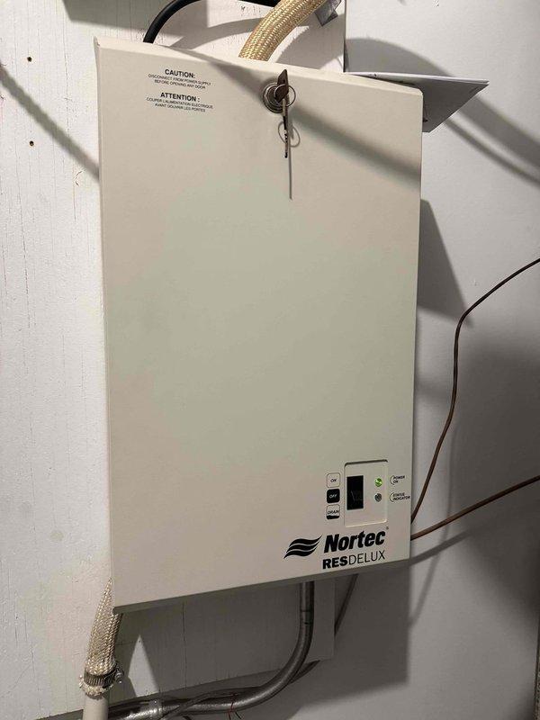 Returned to client's residence to replace canister on Nortec RES DELUX steam humidifier system. Replacement part was not available in time for previously scheduled CNC appointment. Current system readings show indoor humidity level at 69% with ambient temperature of 72°F.