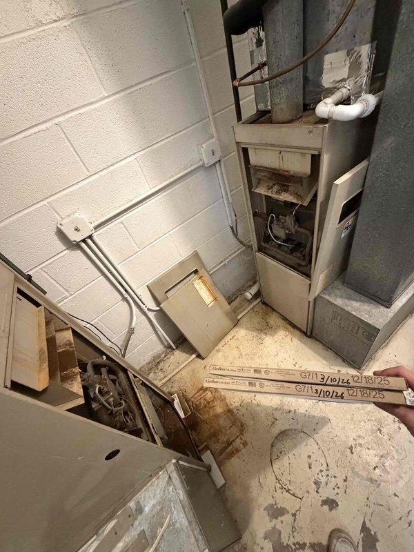 Performed scheduled commercial spring preventative maintenance on HVAC system. Completed comprehensive checklist documentation, inspected and serviced rooftop York condenser unit (#26) showing signs of weathering and roof-mounted furnace. Documented equipment specifications and filter requirements for system database update.