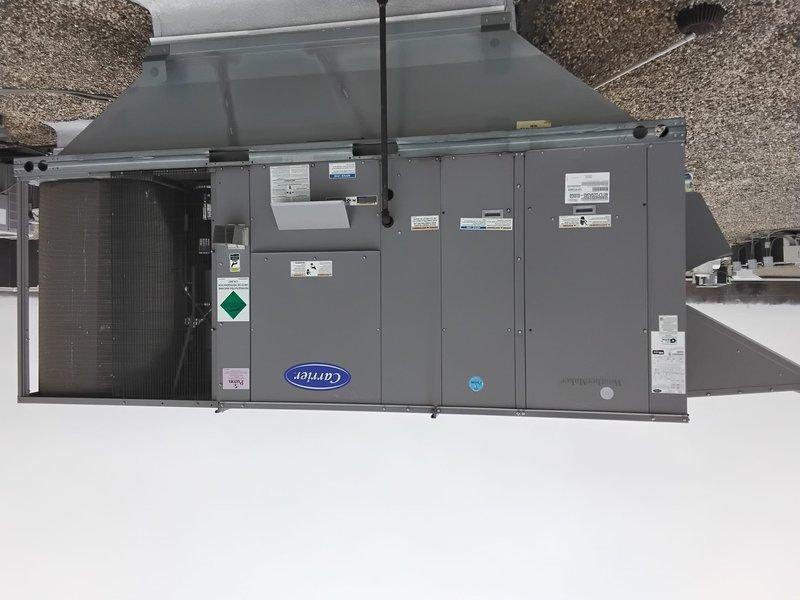 Performed scheduled Clean and Check maintenance service on one Carrier RTU. Inspected system components, replaced six 20x25x2 air filters, and verified proper operation with thermostat set to cooling mode at 78°F (current reading 75°F, 34% humidity). Left boilers operational per instructions. Secured roof access upon completion.