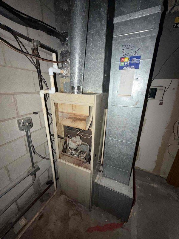 Performed spring commercial maintenance on vacant unit's HVAC system. Accessed equipment via lockbox (code 2424), completed comprehensive checklist inspection, and documented system components through photographs. Inspected electrical control compartment including capacitor, relays, and wiring connections, noting all components in functional condition.