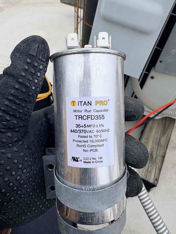 Performed spring commercial CNC maintenance on vacant unit, accessed via lockbox (code 2424). Inspected furnace system and identified failing motor run capacitor (TITAN PRO TRCFD355 35+5MFD); replaced capacitor to restore proper operation. Completed maintenance checklist and documented current equipment specifications for filter list update.