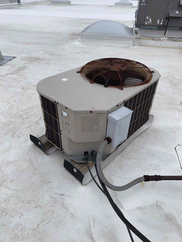 Completed spring commercial preventative maintenance service on rooftop HVAC unit and basement gas furnace per CSA agreement. Documented equipment specifications and filter requirements in service checklist, noting necessary updates to filter inventory. Performed visual inspection of condenser unit, verifying proper operation of fan and examining condition of cooling fins and connected components. All systems functioning within normal parameters.