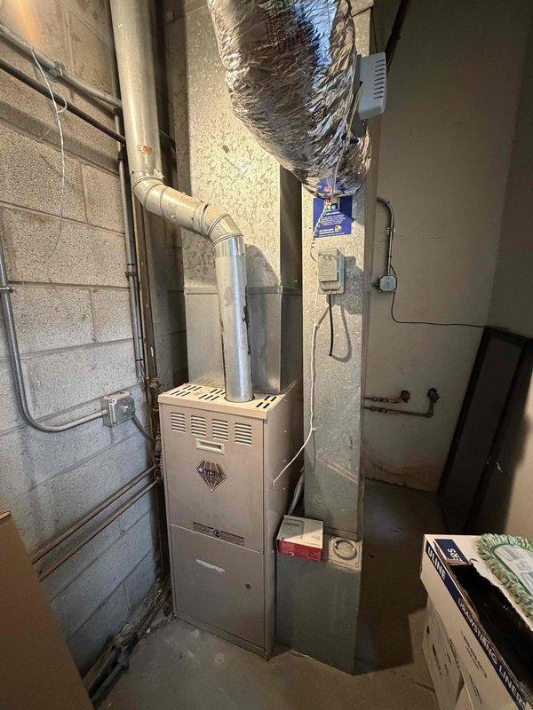 Completed spring commercial preventative maintenance service on rooftop HVAC unit and basement gas furnace per CSA agreement. Documented equipment specifications and filter requirements in service checklist, noting necessary updates to filter inventory. Performed visual inspection of condenser unit, verifying proper operation of fan and examining condition of cooling fins and connected components. All systems functioning within normal parameters.